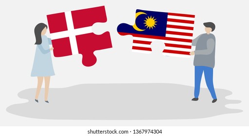 Couple holding two puzzles pieces with Danish and Malaysian flags. Denmark and Malaysia national symbols together.