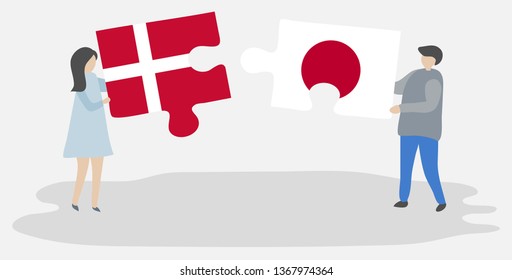 Couple holding two puzzles pieces with Danish and Japanese flags. Denmark and Japan national symbols together.