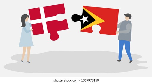 Couple holding two puzzles pieces with Danish and Timorese flags. Denmark and East Timor national symbols together.