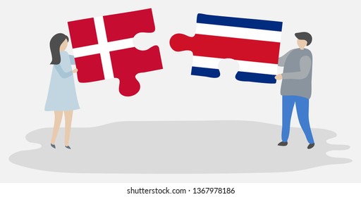 Couple holding two puzzles pieces with Danish and Costa Rican flags. Denmark and Costa Rica national symbols together.