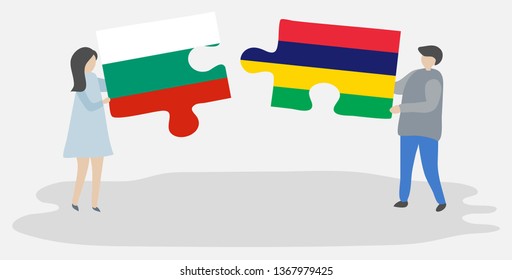 Couple holding two puzzles pieces with Bulgarian and Mauritian flags. Bulgaria and Mauritius national symbols together.