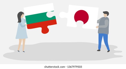 Couple holding two puzzles pieces with Bulgarian and Japanese flags. Bulgaria and Japan national symbols together.