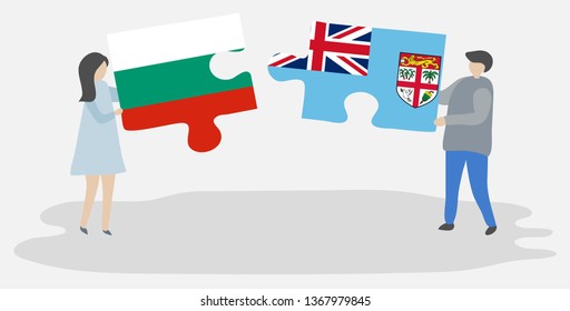 Couple holding two puzzles pieces with Bulgarian and Fijian flags. Bulgaria and Fiji national symbols together.
