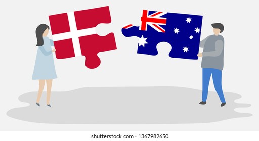 Couple holding two puzzles pieces with Danish and Australian flags. Denmark and Australia national symbols together.
