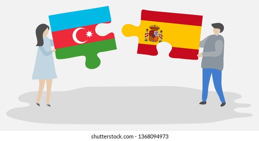 Couple holding two puzzles pieces with Azerbaijani and Spanish flags. Azerbaijan and Spain national symbols together.