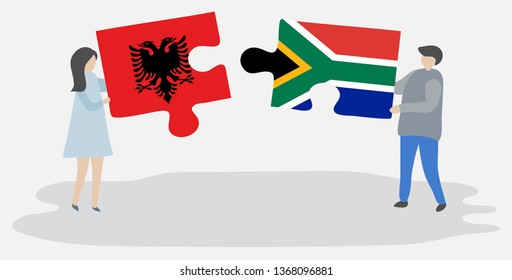 Couple holding two puzzles pieces with Albanian and South African flags. Albania and South Africa national symbols together.
