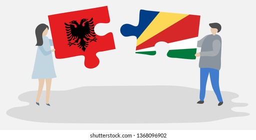 Couple holding two puzzles pieces with Albanian and Seychellois flags. Albania and Seychelles national symbols together.