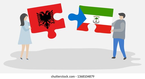 Couple holding two puzzles pieces with Albanian and Equatorial Guinean flags. Albania and Equatorial Guinea national symbols together.