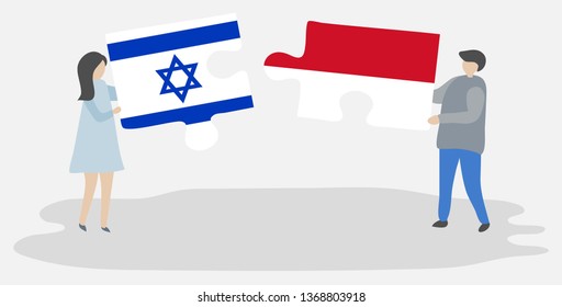 Couple holding two puzzles pieces with Israeli and Indonesian flags. Israel and Indonesia national symbols together.