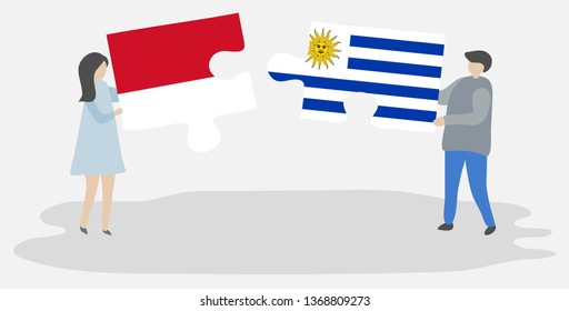 Couple holding two puzzles pieces with Indonesian and Uruguayan flags. Indonesia and Uruguay national symbols together.