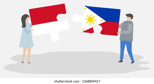 Couple holding two puzzles pieces with Indonesian and Filipino flags. Indonesia and Philippines national symbols together.