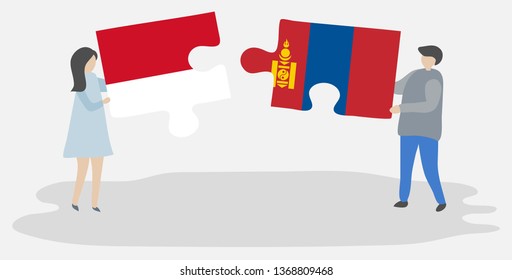 Couple holding two puzzles pieces with Indonesian and Mongolian flags. Indonesia and Mongolia national symbols together.
