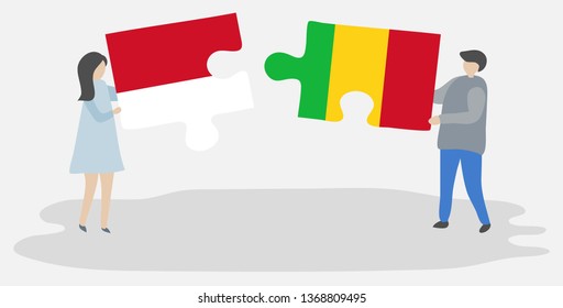 Couple holding two puzzles pieces with Indonesian and Malian flags. Indonesia and Mali national symbols together.