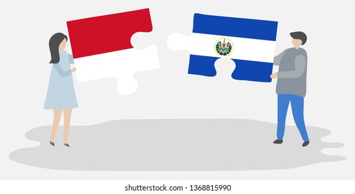 Couple holding two puzzles pieces with Indonesian and Salvadoran flags. Indonesia and El Salvador national symbols together.