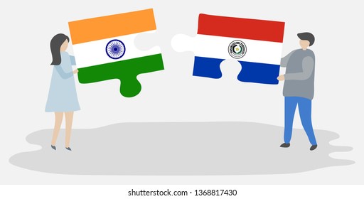 Couple holding two puzzles pieces with Indian and Paraguayan flags. India and Paraguay national symbols together.