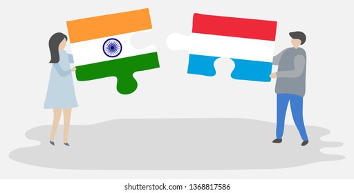 Couple holding two puzzles pieces with Indian and Luxembourgish flags. India and Luxembourg national symbols together.