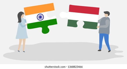 Couple holding two puzzles pieces with Indian and Hungarian flags. India and Hungary national symbols together.