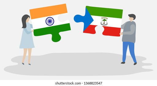 Couple holding two puzzles pieces with Indian and Equatorial Guinean flags. India and Equatorial Guinea national symbols together.