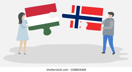 Couple holding two puzzles pieces with Hungarian and Norwegian flags. Hungary and Norway national symbols together.
