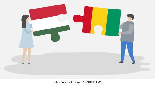 Couple holding two puzzles pieces with Hungarian and Guinean flags. Hungary and Guinea national symbols together.