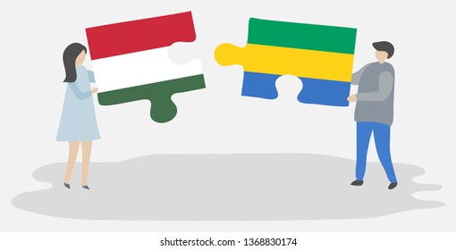 Couple holding two puzzles pieces with Hungarian and Gabonese flags. Hungary and Gabon national symbols together.