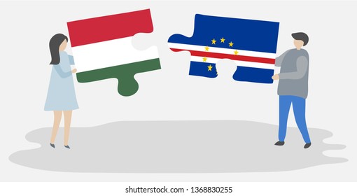 Couple holding two puzzles pieces with Hungarian and Cabo Verdean flags. Hungary and Cape Verde national symbols together.