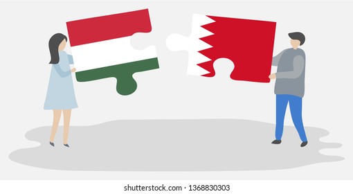 Couple holding two puzzles pieces with Hungarian and Bahraini flags. Hungary and Bahrain national symbols together.