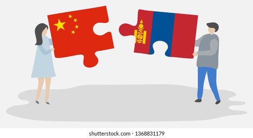 Couple holding two puzzles pieces with Chinese and Mongolian flags. China and Mongolia national symbols together.