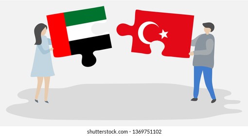 Couple holding two puzzles pieces with Emirian and Turkish flags. United Arab Emirates and Turkey national symbols together.