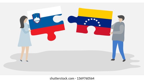 Couple holding two puzzles pieces with Slovenian and Venezuelan flags. Slovenia and Venezuela national symbols together.