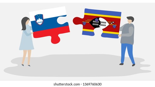 Couple holding two puzzles pieces with Slovenian and Swazi flags. Slovenia and Swaziland national symbols together.