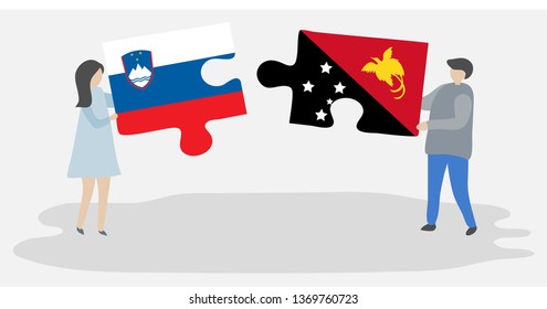 Couple holding two puzzles pieces with Slovenian and Papuan flags. Slovenia and Papua New Guinea national symbols together.