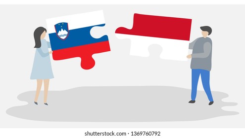 Couple holding two puzzles pieces with Slovenian and Monegasque flags. Slovenia and Monaco national symbols together.