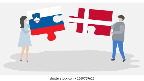 Couple holding two puzzles pieces with Slovenian and Danish flags. Slovenia and Denmark national symbols together.