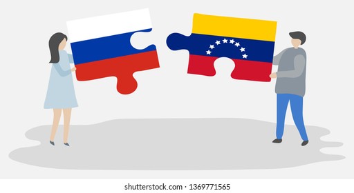 Couple holding two puzzles pieces with Russian and Venezuelan flags. Russia and Venezuela national symbols together.
