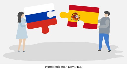 Couple holding two puzzles pieces with Russian and Spanish flags. Russia and Spain national symbols together.