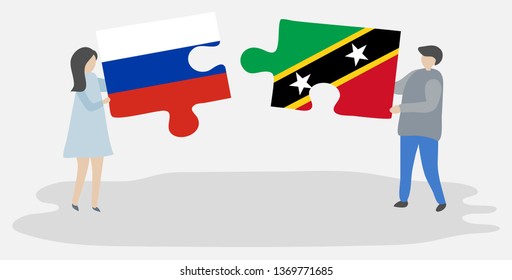 Couple holding two puzzles pieces with Russian and Kittitian flags. Russia and Saint Kitts and Nevis national symbols together.