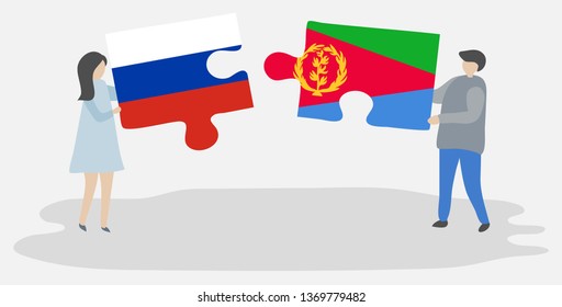 Couple holding two puzzles pieces with Russian and Eritrean flags. Russia and Eritrea national symbols together.