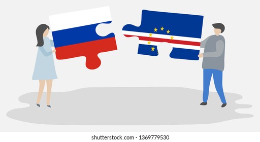 Couple holding two puzzles pieces with Russian and Cabo Verdean flags. Russia and Cape Verde national symbols together.