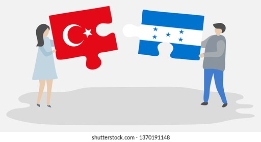 Couple holding two puzzles pieces with Turkish and Honduran flags. Turkey and Honduras national symbols together.