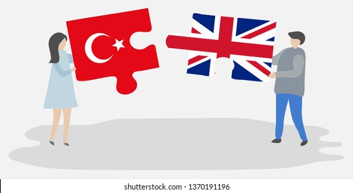 Couple holding two puzzles pieces with Turkish and British flags. Turkey and United Kingdom national symbols together.