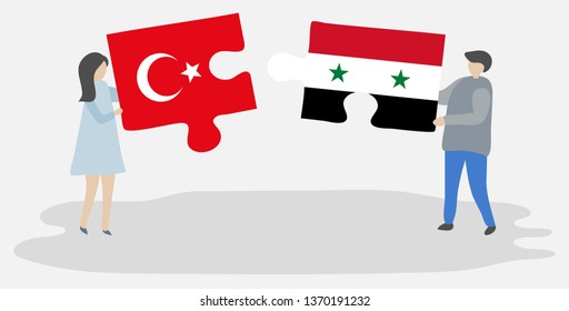 Couple holding two puzzles pieces with Turkish and Syrian flags. Turkey and Syria national symbols together.