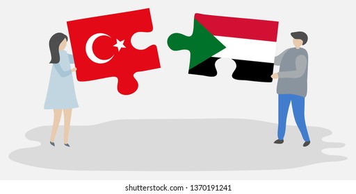 Couple holding two puzzles pieces with Turkish and Sudanese flags. Turkey and Sudan national symbols together.