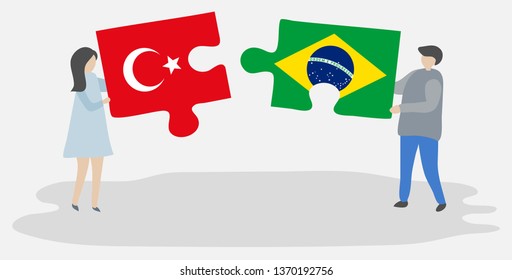 Couple holding two puzzles pieces with Turkish and Brazilian flags. Turkey and Brazil national symbols together.