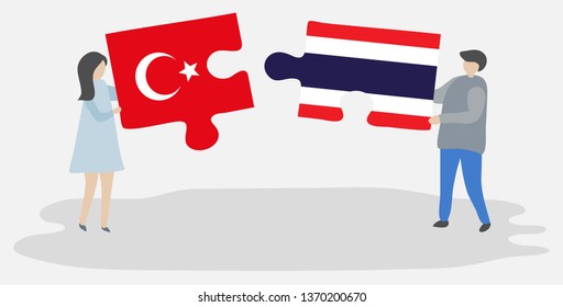 Couple holding two puzzles pieces with Turkish and Thai flags. Turkey and Thailand national symbols together.