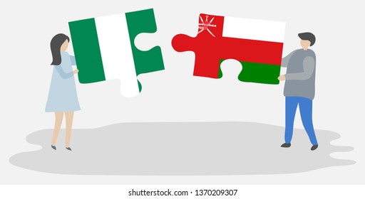 Couple holding two puzzles pieces with Nigerian and Omani flags. Nigeria and Oman national symbols together.