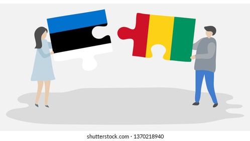 Couple holding two puzzles pieces with Estonian and Guinean flags. Estonia and Guinea national symbols together.