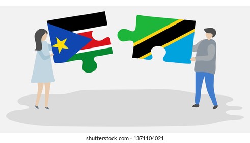Couple holding two puzzles pieces with South Sudanese and Tanzanian flags. South Sudan and Tanzania national symbols together.