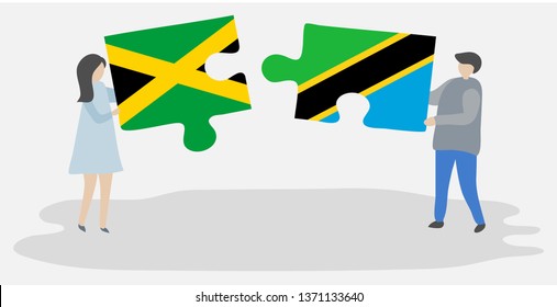 Couple holding two puzzles pieces with Jamaican and Tanzanian flags. Jamaica and Tanzania national symbols together.