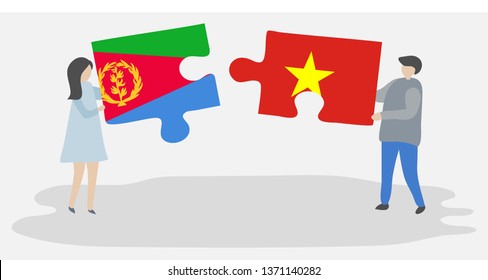 Couple holding two puzzles pieces with Eritrean and Vietnamese flags. Eritrea and Vietnam national symbols together.